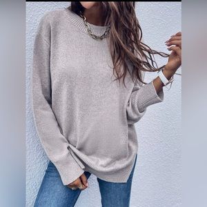 Split hem sweater
